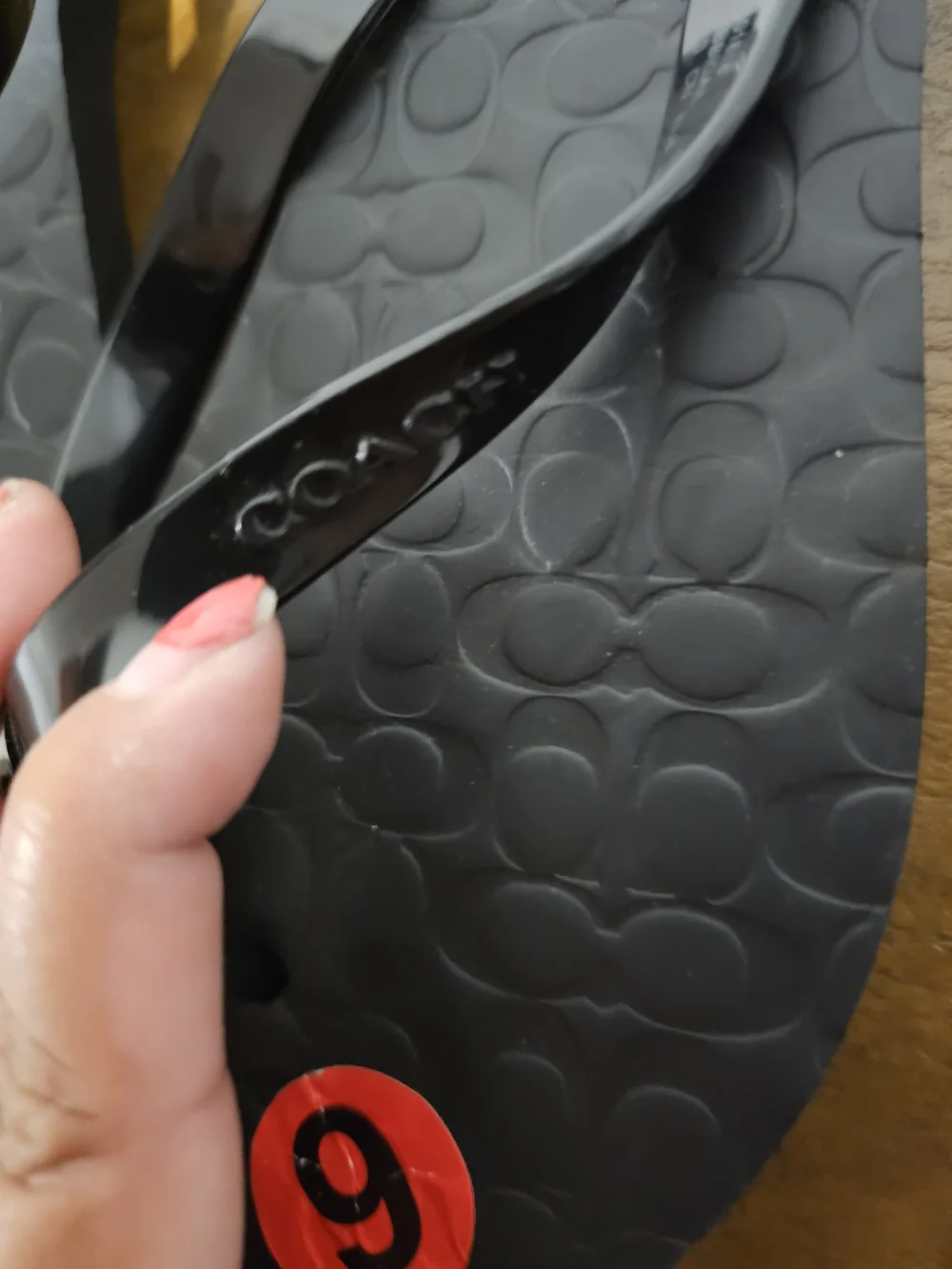 COACH Black Logo Flip Flop Sandals